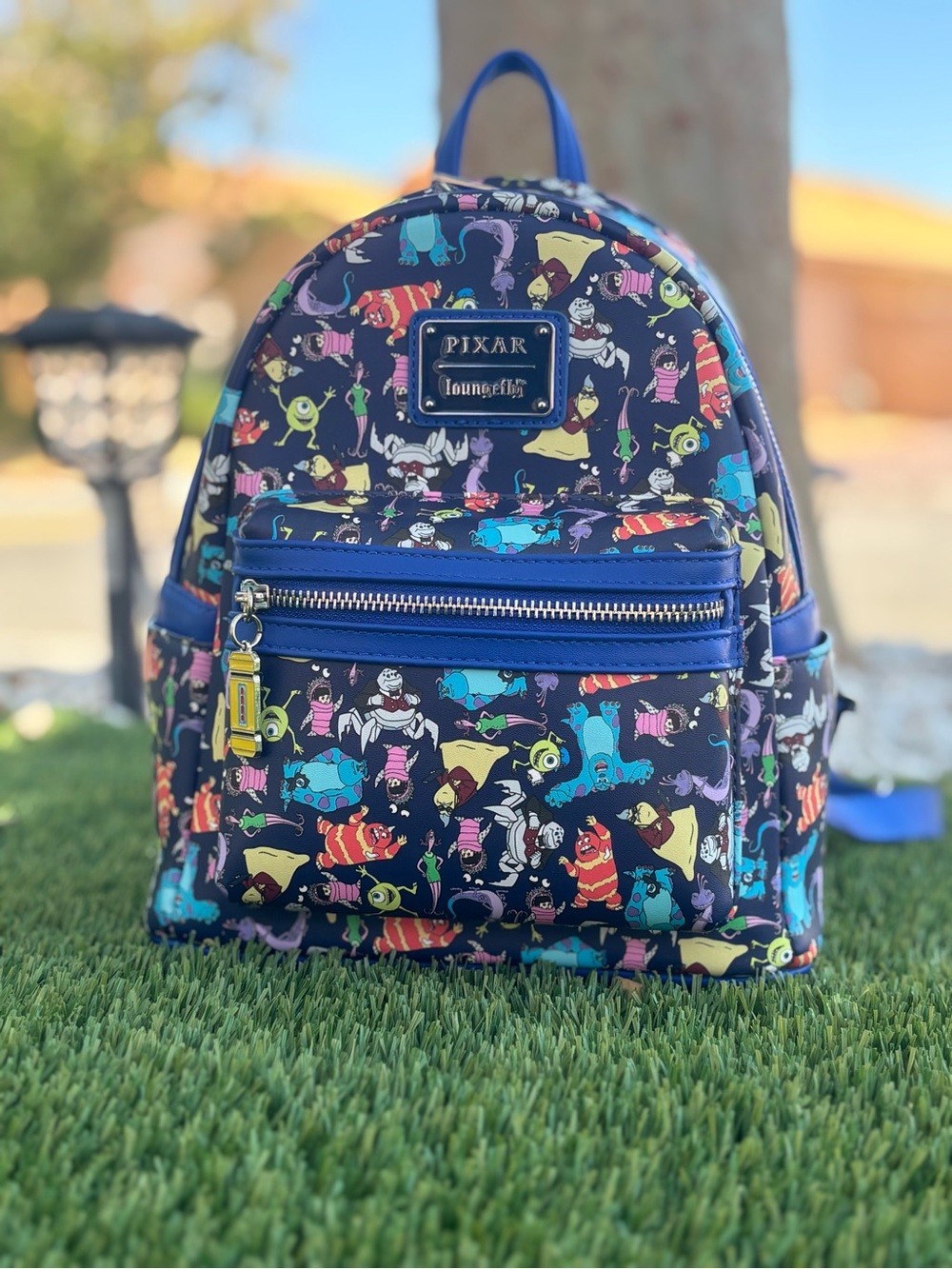 Loungefly Navy Monsters inc. Print Mini Backpack